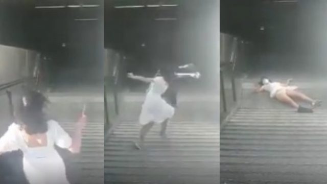 少女低頭玩電話意外碌樓梯 底褲全露